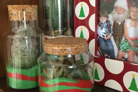 Create Christmas Cacti Sand Art Terrariums to add a unique spin to your holiday decor this year!